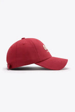 Red CREATE NEW LIFE cotton baseball cap with curved brim and adjustable strap