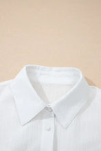 White textured cotton button-up shirt with crinkled texture and lantern sleeve button design for a loose fit look