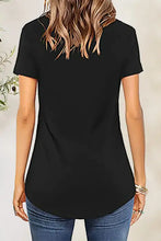Woman’s black crisscross short sleeve t-shirt with rounded hem