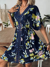 Navy blue floral print V-neck dress with lace trim, size options