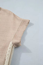 Beige linen pullover rolled short sleeve blouse with delicate white crochet lace trim along the sleeve
