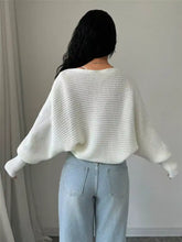 Cropped knit open front cardigan in soft off-white with shoulder seam