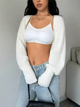 Cropped knit open front cardigan with shoulder seam and ribbed cuffs