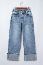 Light-wash denim cuffed straight loose jeans with high-rise wide-leg cut and rolled cuffs featuring striped fabric accents