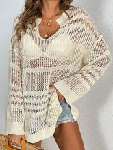 Cream cutout notched long sleeve cover-up with distressed denim shorts