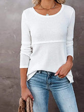 Cutout round neck long sleeve white waffle knit top with distressed jeans
