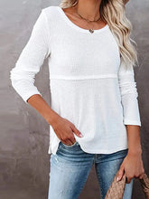 Woman in cutout round neck long sleeve waffle knit top with jeans