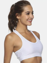 White racerback sports bra with adjustable straps, machine wash cold