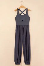 Cutout square neck charcoal gray active jumpsuit with crisscross back