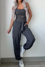 Cutout square neck wide strap charcoal gray active jumpsuit with elastic waist and pockets, machine wash cold