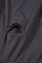 Dark gray waterproof jacket with cutout square neck details