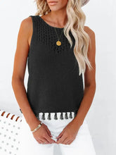 Black knitted sleeveless cutout tassel round neck tank with textured pattern and tassels along the hem