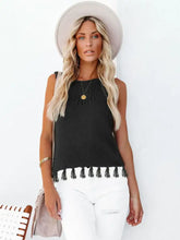 Black knitted sleeveless round neck tank with cutout tassel round hem fringe detailing