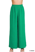 Vibrant emerald green zenana woven airflow wide-leg pants with soft textured fabric and elastic waistband