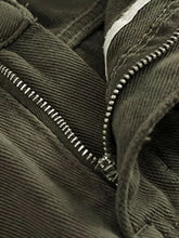 Full size wide leg pants plus size in dark green denim with a silver zipper along the seam and pockets