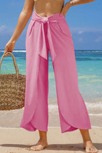 Pink knotted waist split leg relaxed pants with wide legs for a comfortable and stylish everyday look