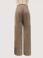 Beige ribbed corduroy wide leg pants with elastic waistband designed as comfortable drawstring wide leg pants