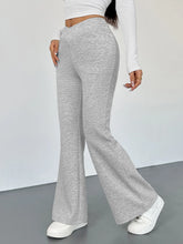 Gray heathered high waisted flare leg pants with a comfortable relaxed fit and wide leg design