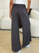 Dark gray Basic Bae full size smocked wide waistband wide leg pants with stretchy elastic waistband and care instructions