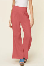 Coral-colored double take full size texture smocked waist wide leg pants with high-waisted elastic waistband