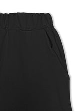 Black comfortable elastic waist casual pants with sleek fabric and subtle side seam detailing