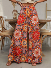 Vibrant red and orange floral printed wide leg pants with bohemian design for stylish casual wear