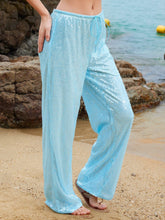 Light blue sequin wide leg pants with drawstring waist featuring wide leg pants design for elegant wear