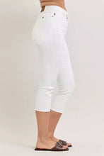 White denim capri pants by Judy Blue featuring a high waist extended waistband and spade five-pocket design