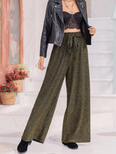 Olive green ribbed velvet wide leg pants with a high waist tie drawstring for a comfortable fit