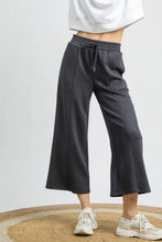 Dark gray umgee wide leg cropped pants with a drawstring waistband for comfortable casual wear