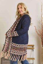 Navy blue aztec border cardigan with fringe hem and patterned sleeves