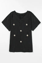 Black short-sleeve V-neck T-shirt with daisy embroidery