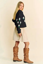 Dani floral pattern embroidered hoodie jacket in black and white with tan boots