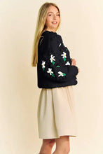 Dani floral pattern embroidered black hoodie with beige skirt