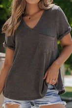 Dark gray ribbed knit V-neck short sleeve top with chest pocket