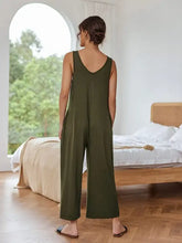 Back view of olive green Davi & Dani v-back sleeveless jumpsuit, machine wash cold