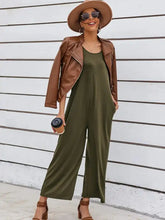 Olive green Davi & Dani romper with pockets, machine wash cold