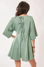Sage green Davi & Dani draped sleeve ties back romper back view