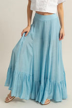 Light blue hyfve high-waist ruffle flared wide leg pants with tiered ruffles and flowing fabric design