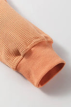 Peach V-neck long sleeve waffle knit top with ribbed cuffs, basic style, slightly stretchy