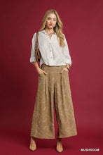 Beige umgee jacquard wide-leg pants featuring subtle leaf pattern and pleated design for stylish comfort