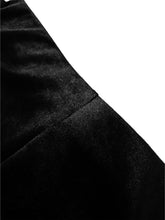 Black high waist velvet flare pants featuring soft plush fabric with subtle sheen and a luxurious texture