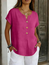 Vibrant magenta decor button short sleeve blouse with wooden buttons and relaxed fit perfect for casual wear