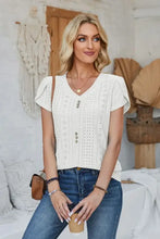 Women’s off-white decorative button eyelet V-neck short sleeve top