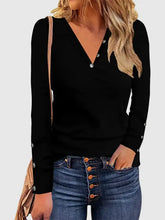 Women’s black long sleeve V-neck T-shirt with decorative button
