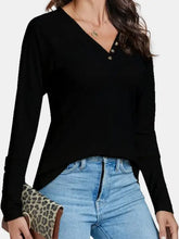 Black long sleeve V-neck henley with decorative button