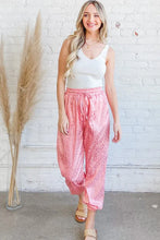 Pink satin leopard print joggers with drawstring waist and elastic cuffs machine wash cold safe