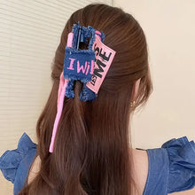 Denim hair claw clip with i will love me text and pink accents on acrylic braided rope