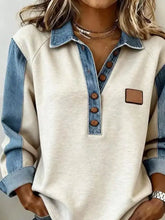 Beige and denim patchwork long-sleeve henley top with brown buttons and leather-like pocket denim trim button detail sweatshirt