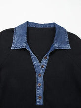 Black ribbed knit top featuring a denim trim button placket and denim collar for a stylish casual look